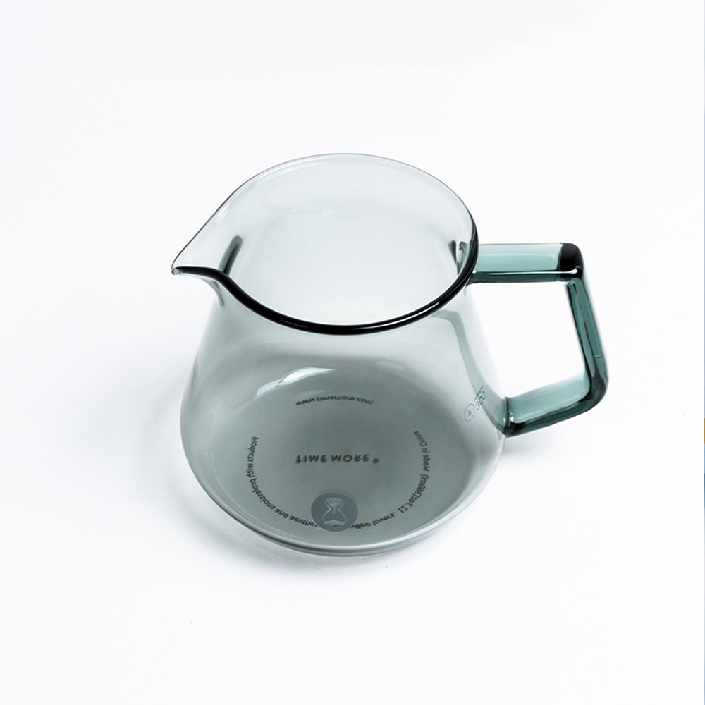 Coffee server pouring into a cup