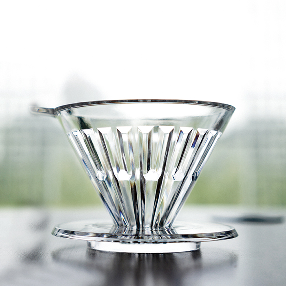 Transparent black dripper shown with filter paper seated inside